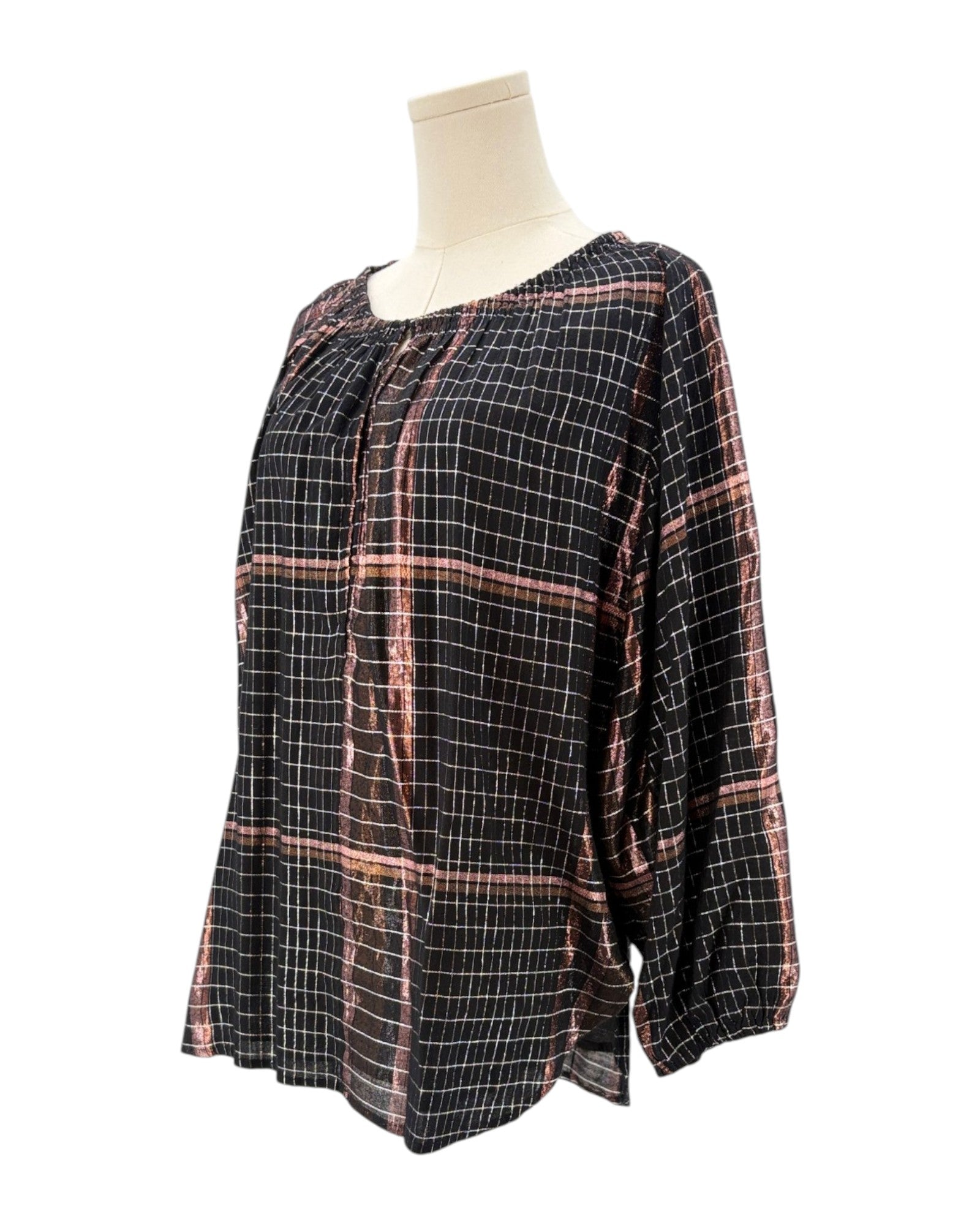 Apiece Apart metallic plaid shirt on a mannequin against a white background