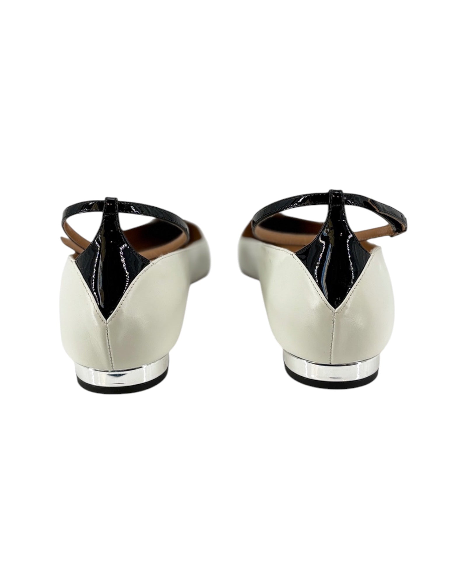 White shoes with black accents on a white background