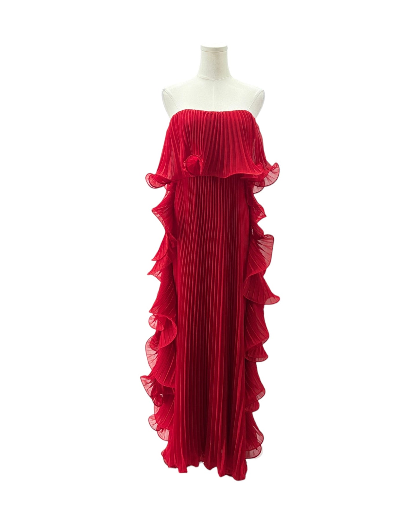 Red evening gown on a mannequin against a white background