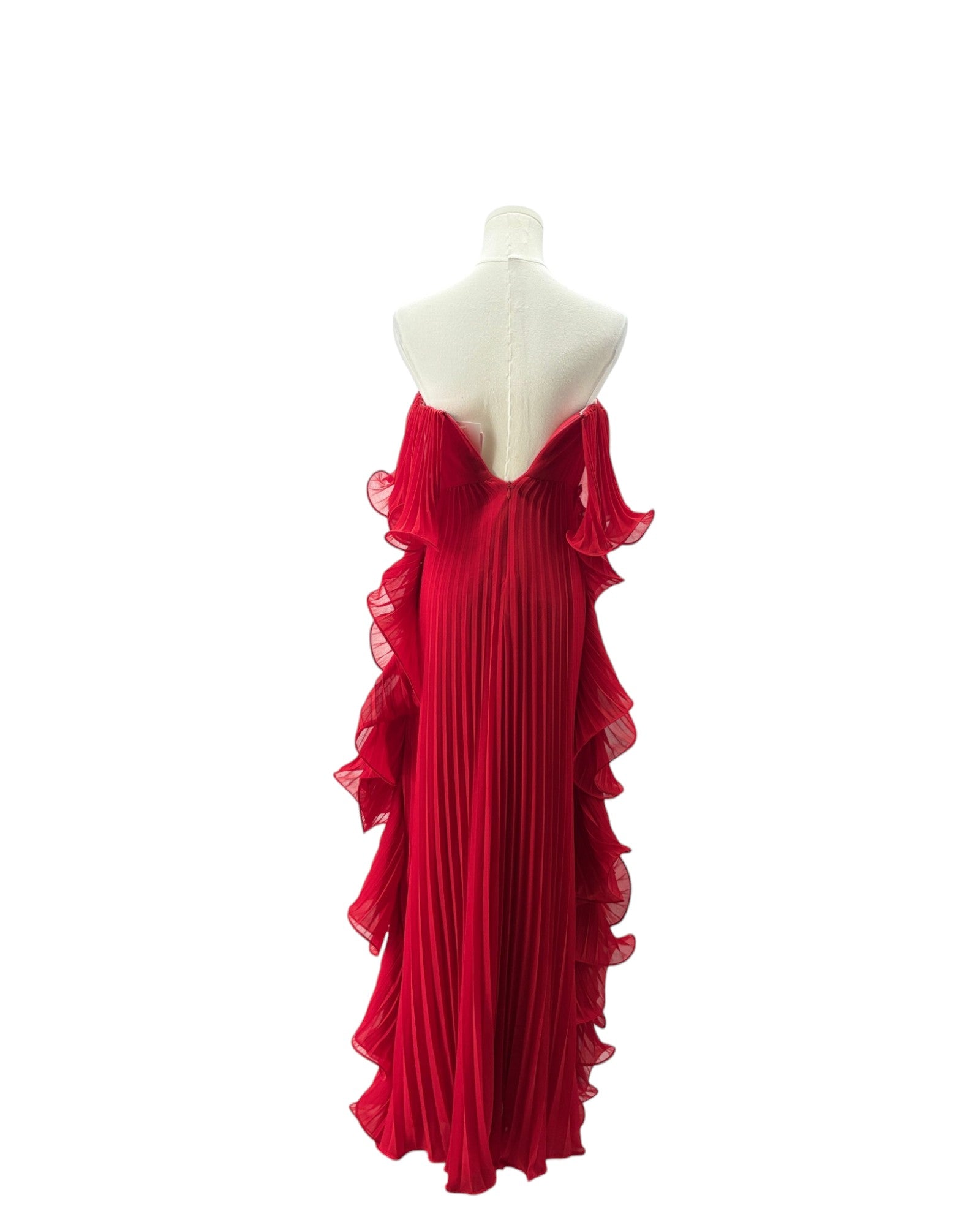 Red evening gown on a mannequin against a white background