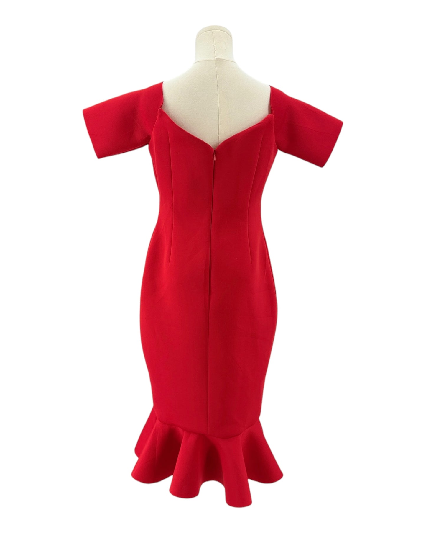 Red dress on a mannequin against a white background