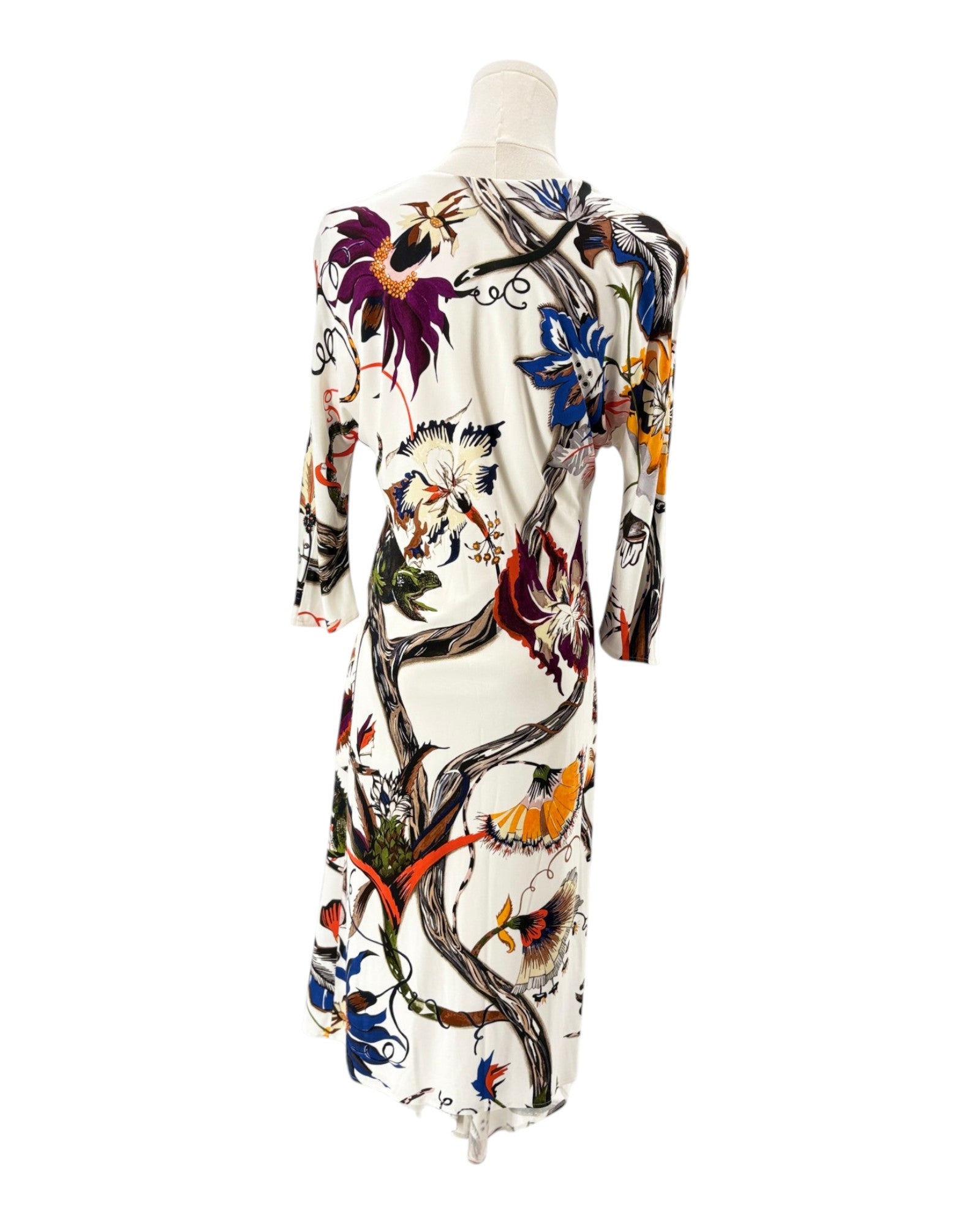 Balenciaga silk floral dress on a mannequin against a white background