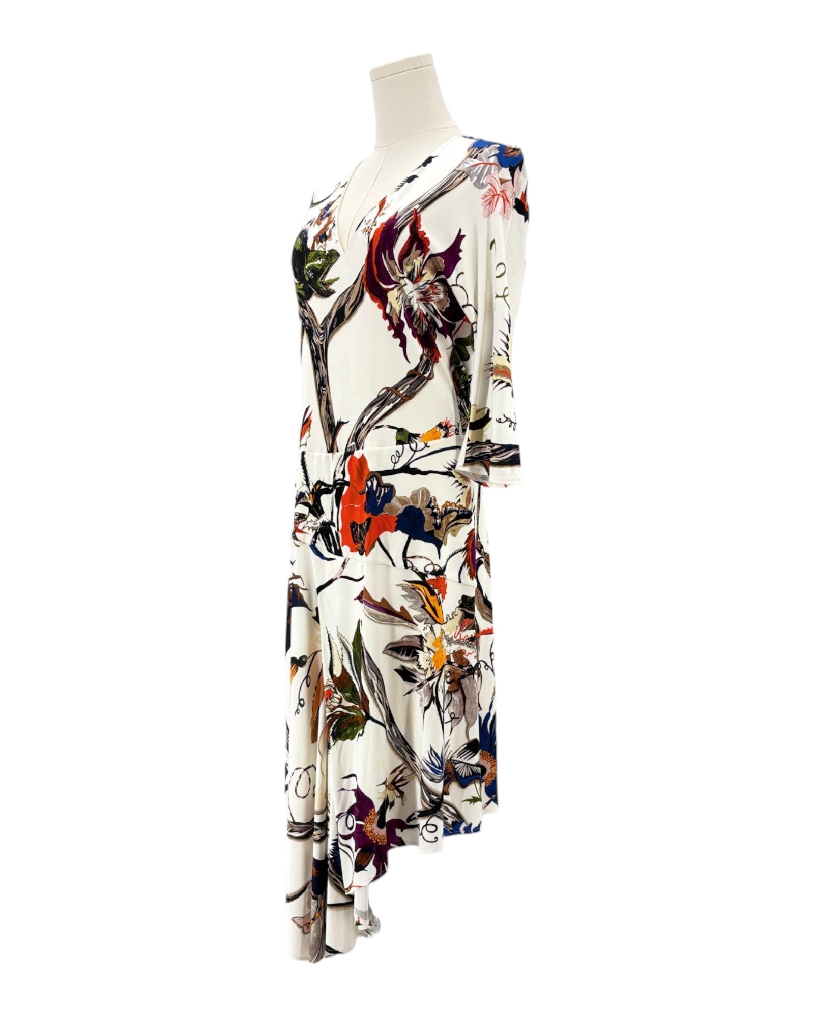 Balenciaga silk floral dress on a mannequin against a white background