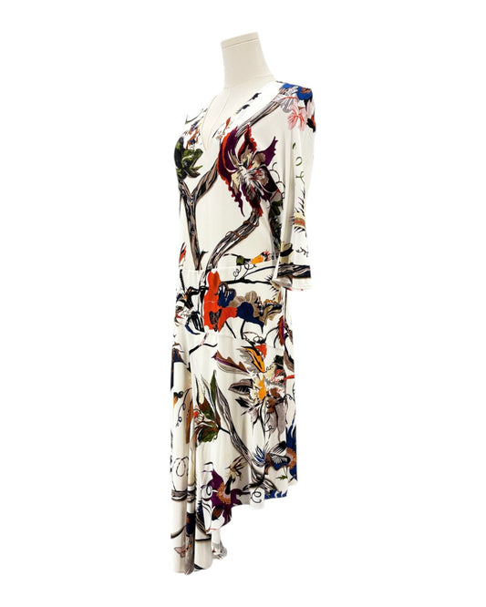 Balenciaga silk floral dress on a mannequin against a white background