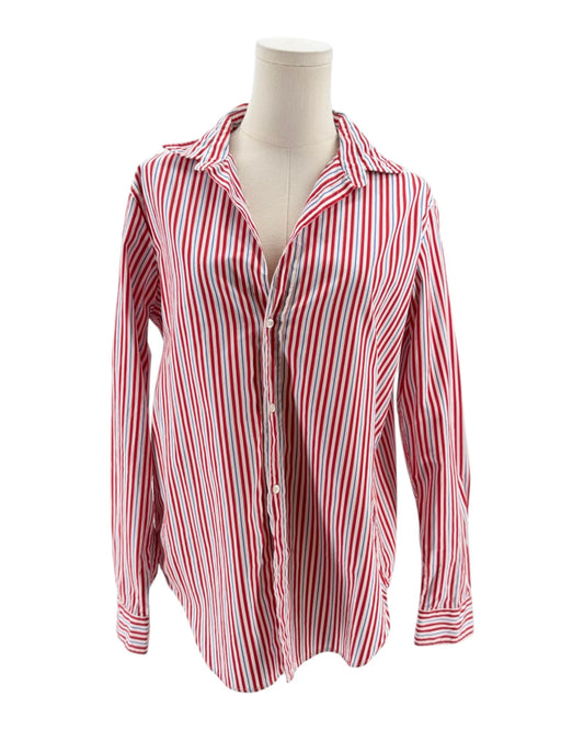 Red and white striped shirt on a mannequin against a white background