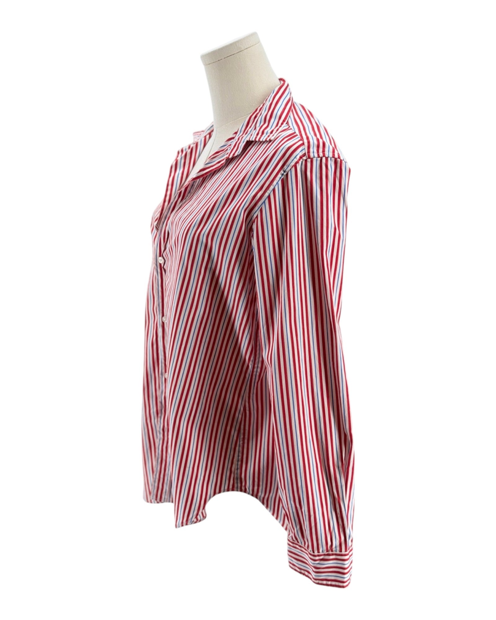 Red and white striped shirt on a mannequin against a white background