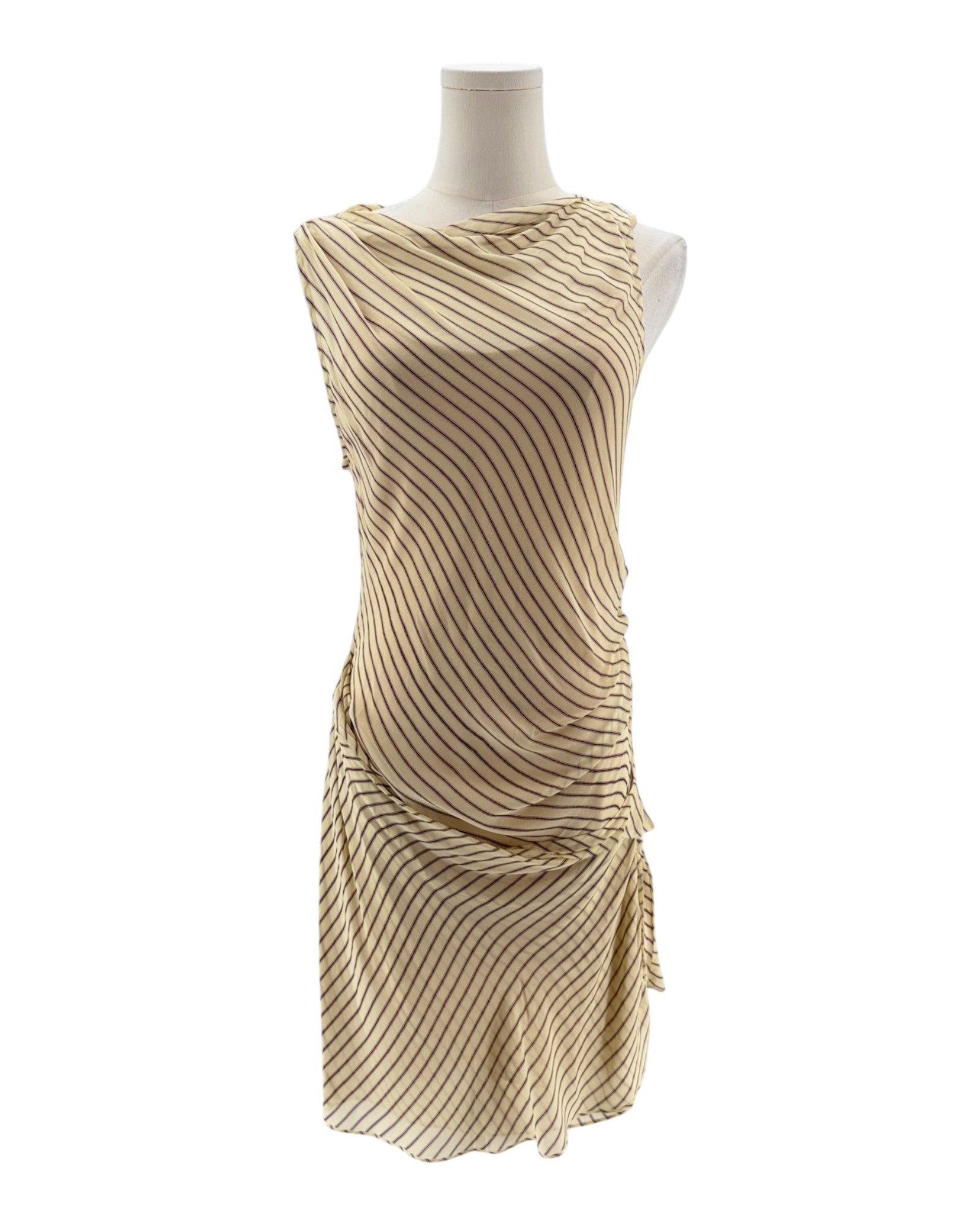 Beige dress on a mannequin against a white background