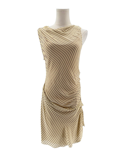 Beige dress on a mannequin against a white background