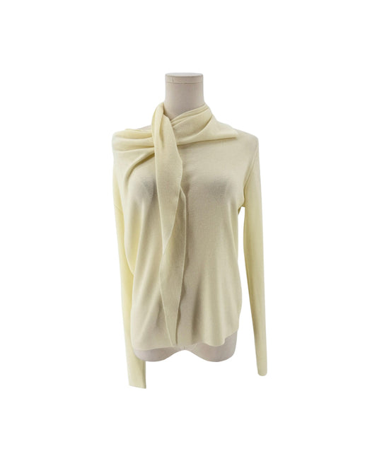 Long sleeve cream sweater with built in scarf neckline on a mannequin on a white background