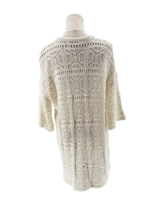 Knit dress on a mannequin against a white background