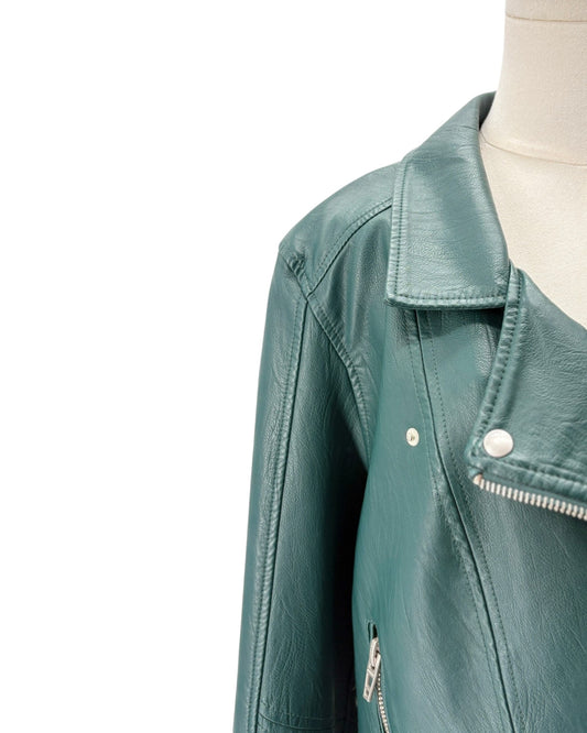 A close-up of a teal green faux leather motorcycle jacket displayed on a cream mannequin torso against a plain white background.