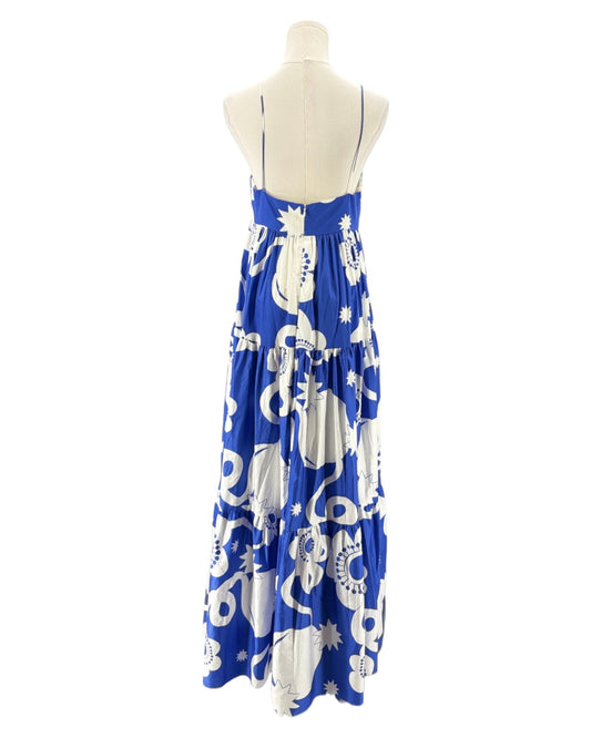 Blue dress with white patterns on a mannequin against a white background