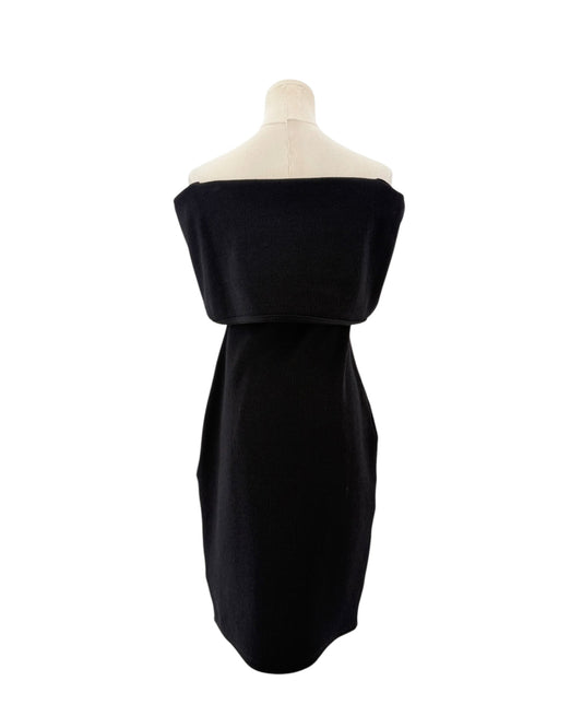 Black off-the-shoulder neckline, crinkled jersey fabric, midi length dress on a mannequin on a white background