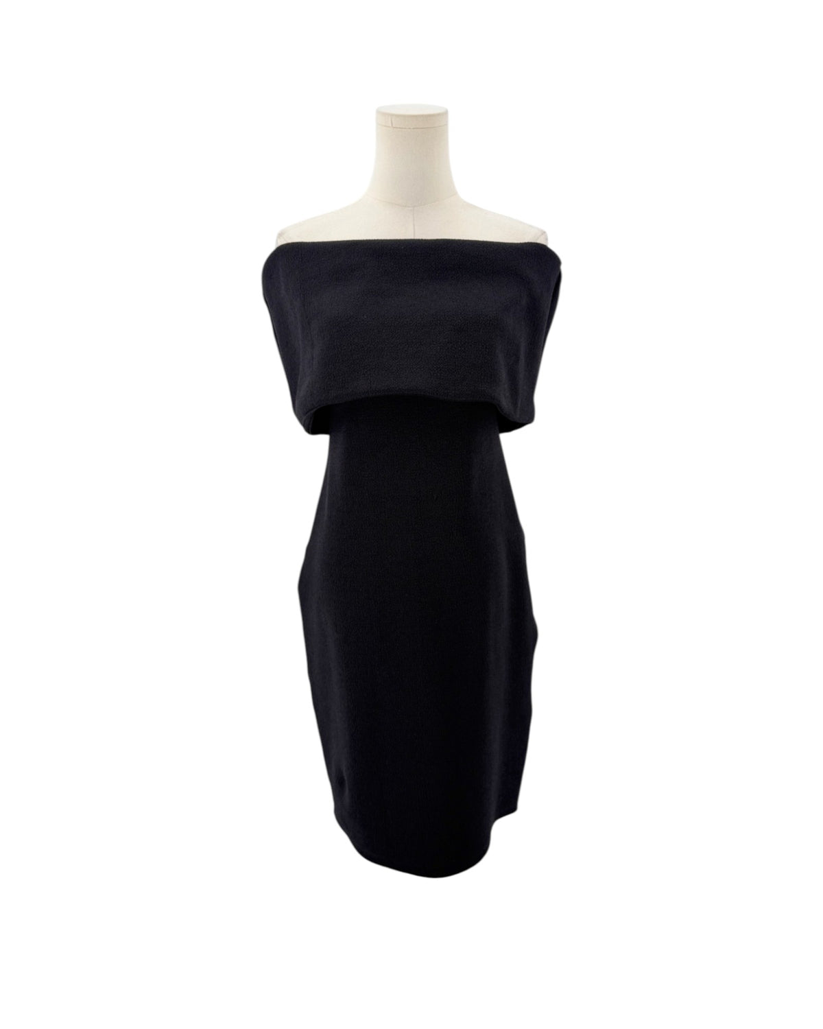 Black off-the-shoulder neckline, crinkled jersey fabric, midi length dress on a mannequin on a white background