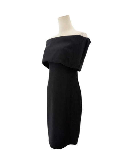 Black off-the-shoulder neckline, crinkled jersey fabric, midi length dress on a mannequin on a white background