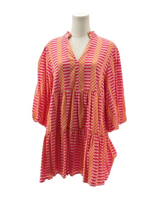 Pink and orange striped dress on a mannequin against a white background