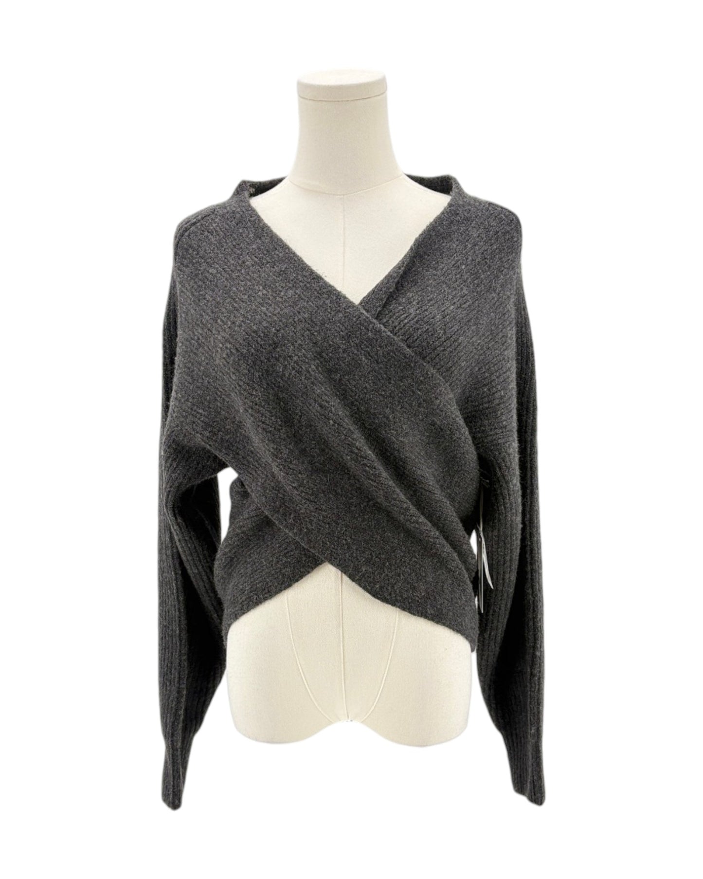 Gray wrap-style sweater on a mannequin against a white background