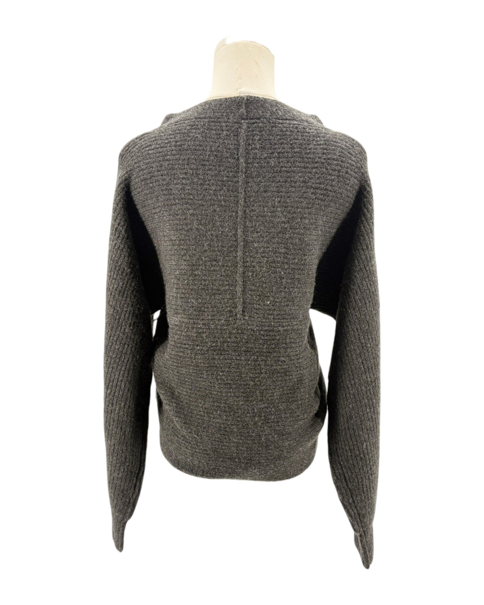 Gray textured sweater on a mannequin against a white background