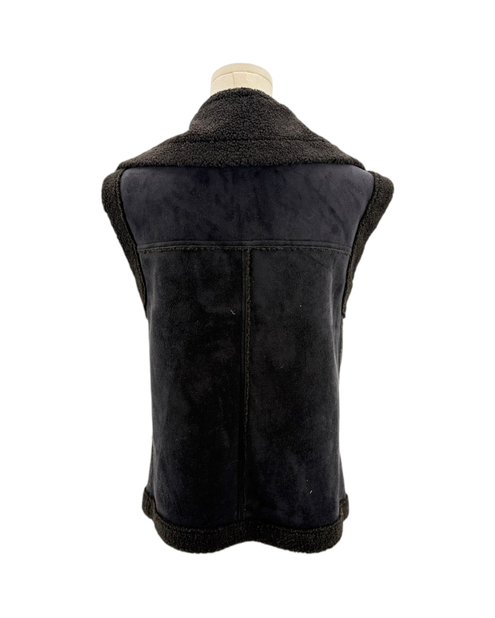 Black vest with shearling collar on a mannequin against a white background