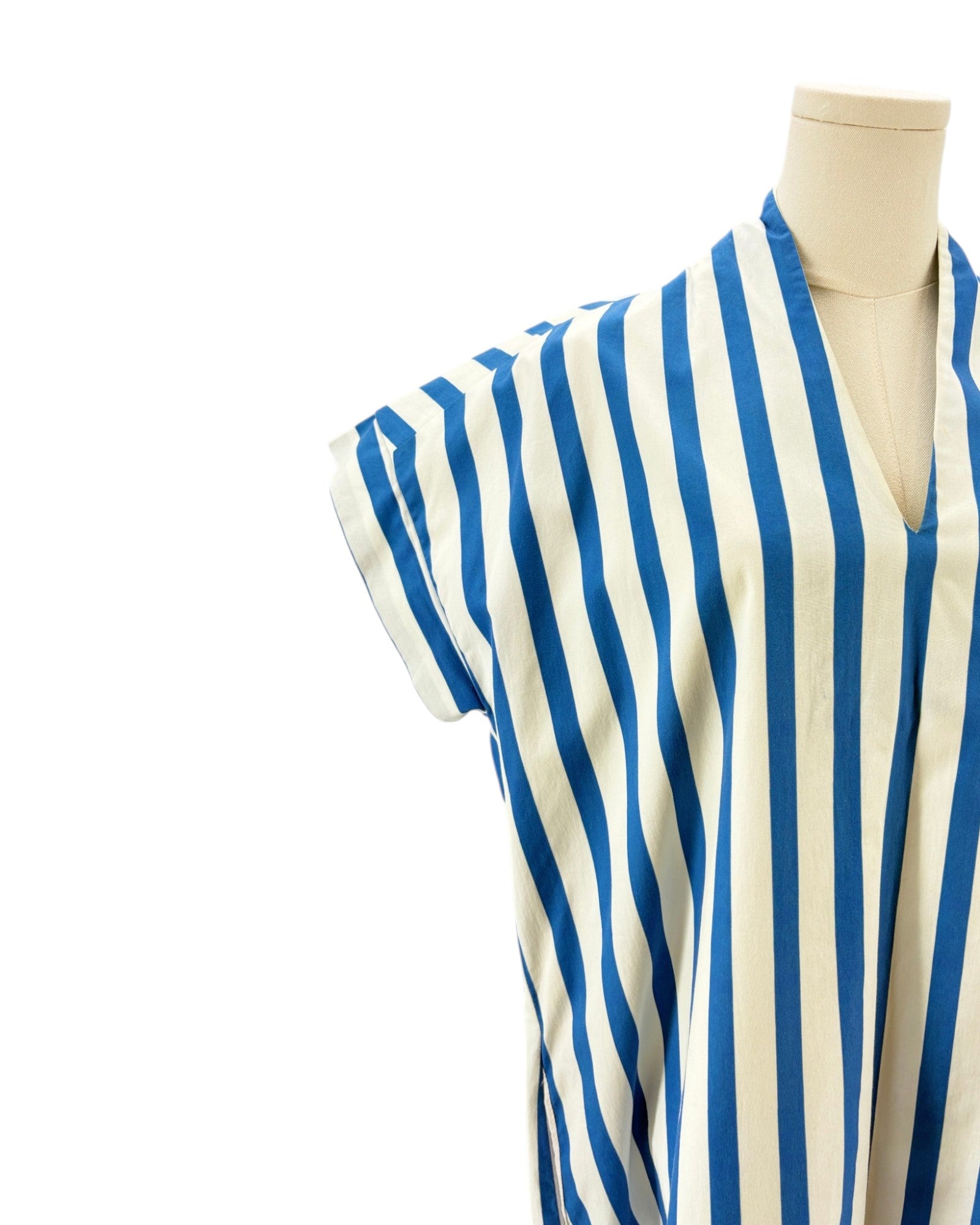 Brooke Wright blue and white striped garment on a mannequin against a white background