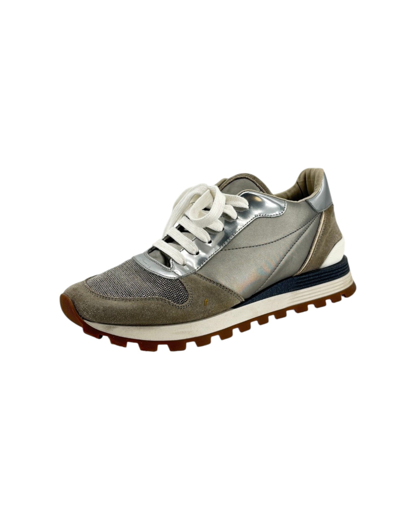 Gray and silver sneaker on a white background