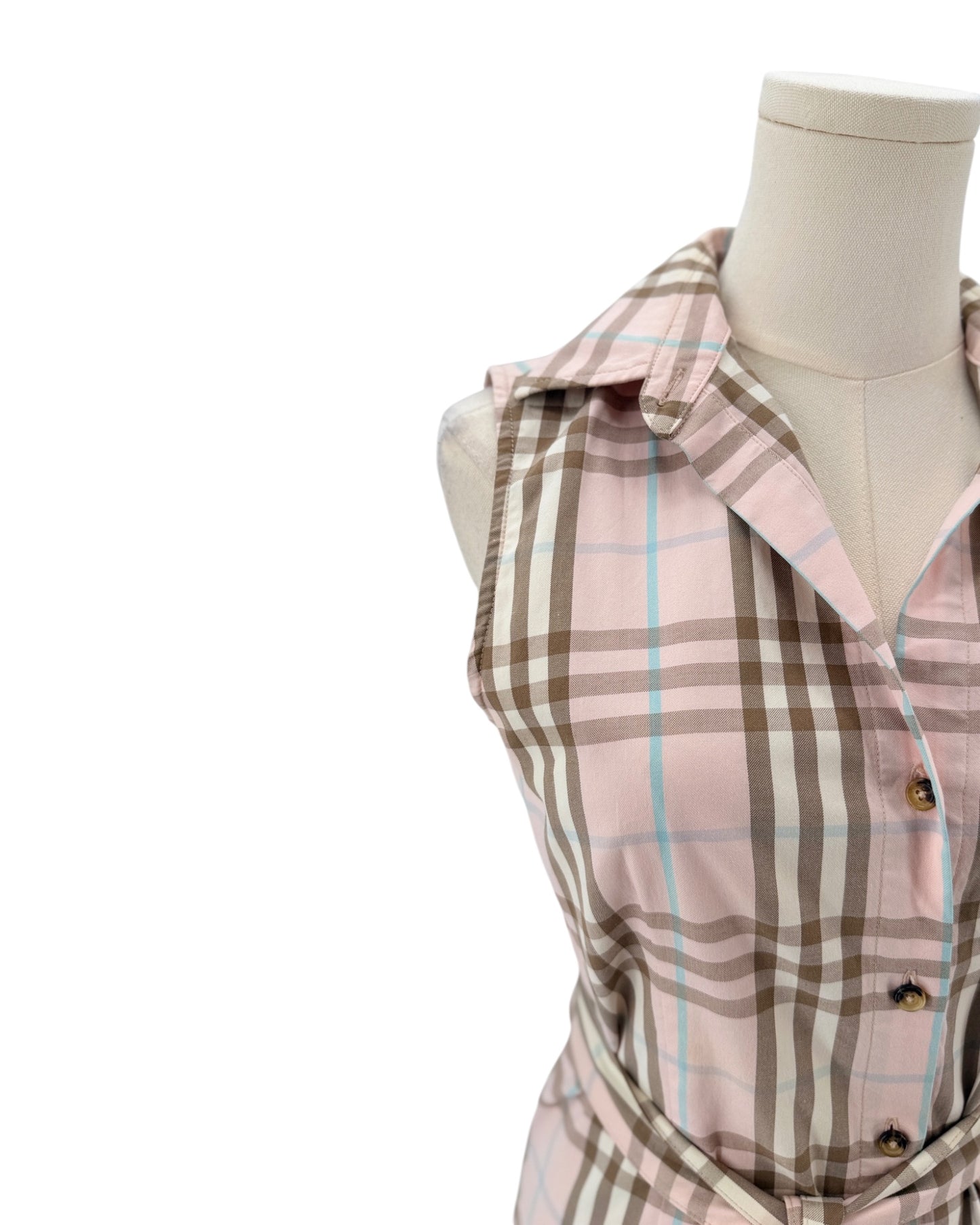 Plaid shirt on a mannequin against a white background