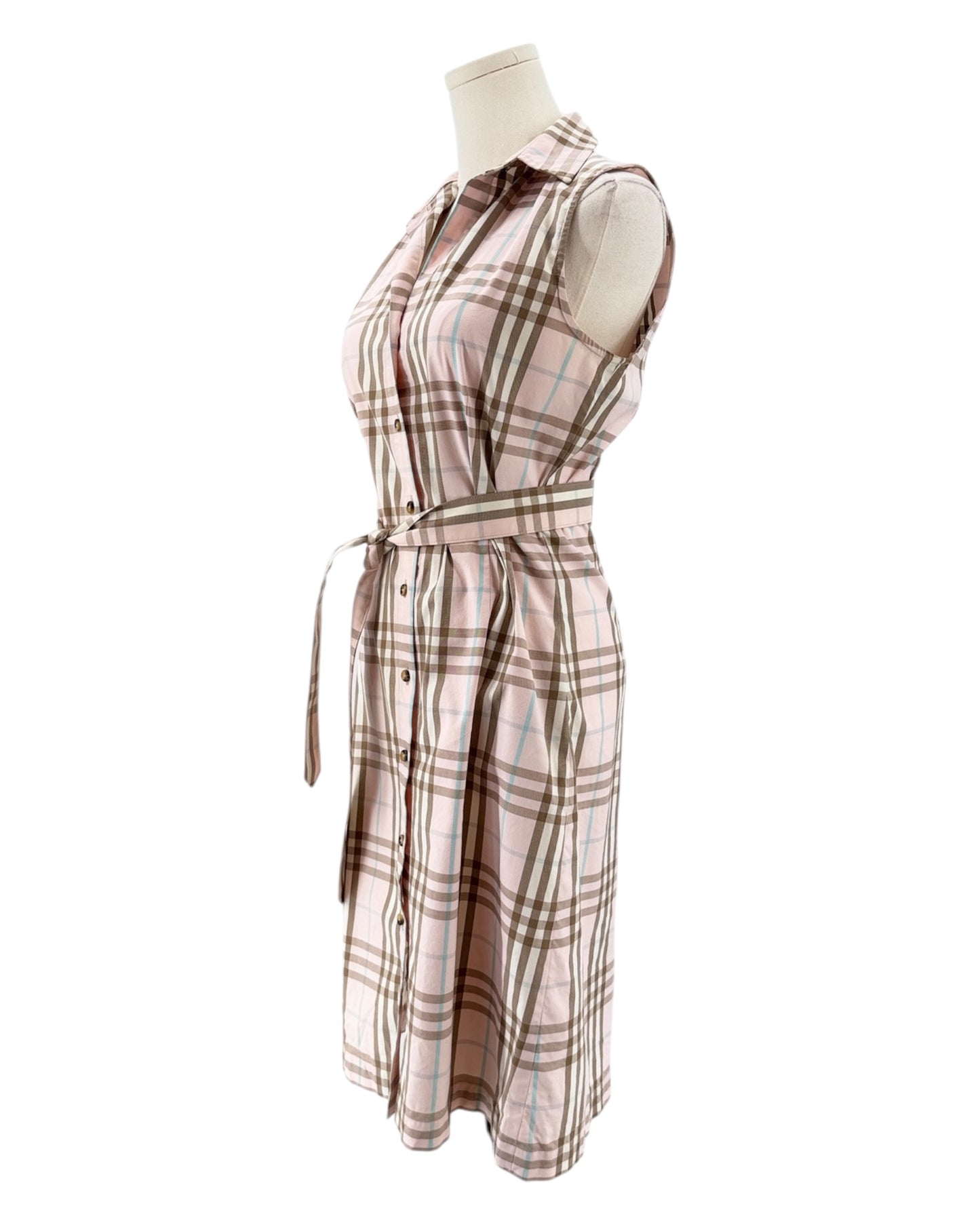 Plaid dress on a mannequin against a white background