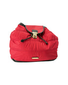 Red backpack with a gold zipper on a white background