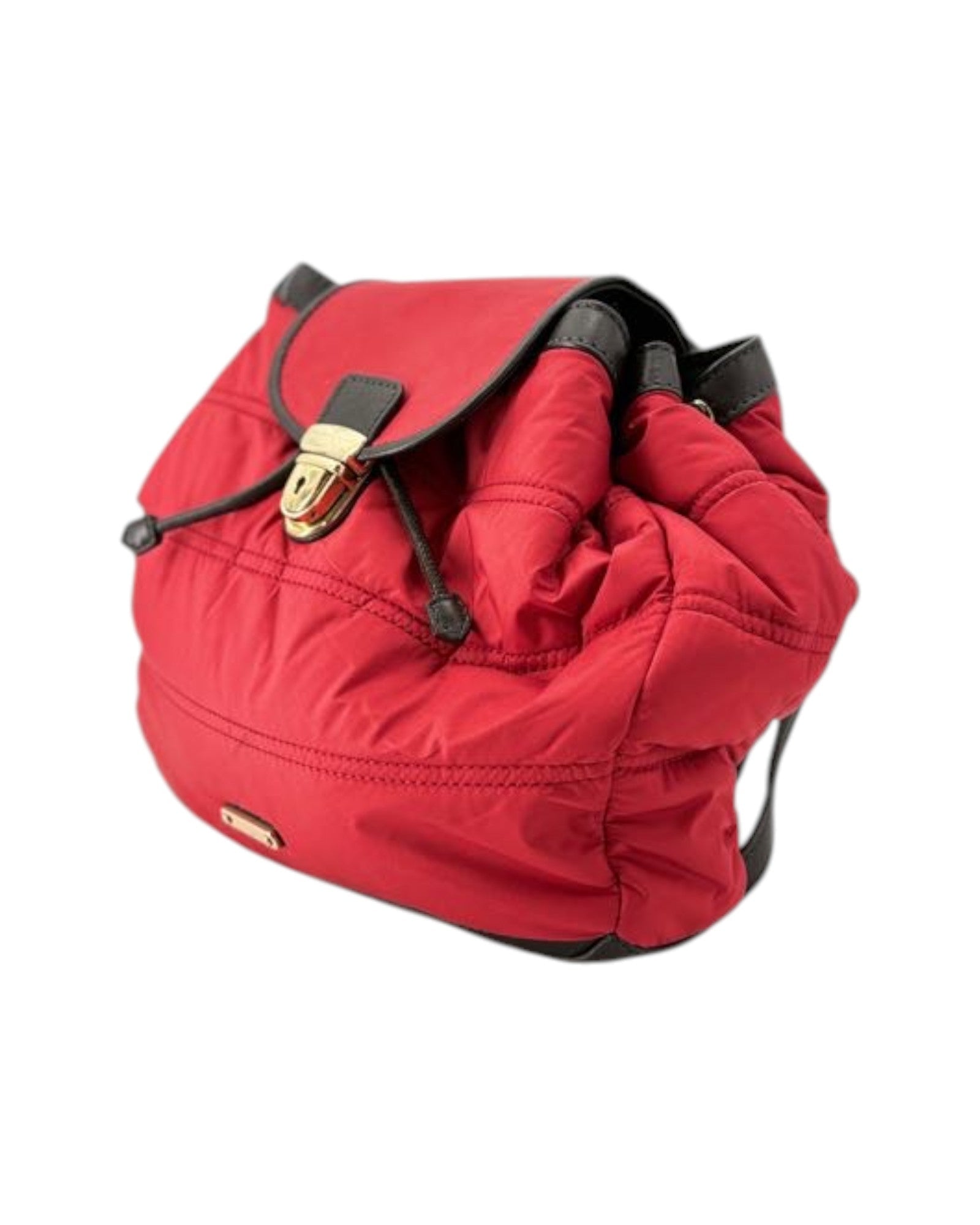 Red backpack with a gold buckle on a white background