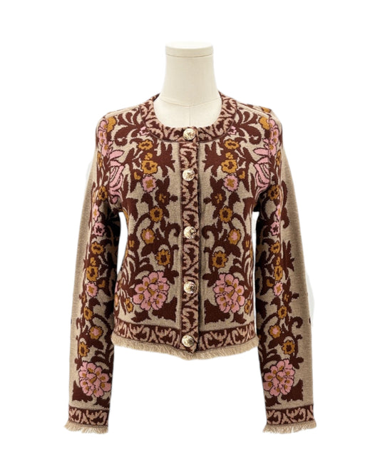 Floral patterned jacket on a mannequin against a white background