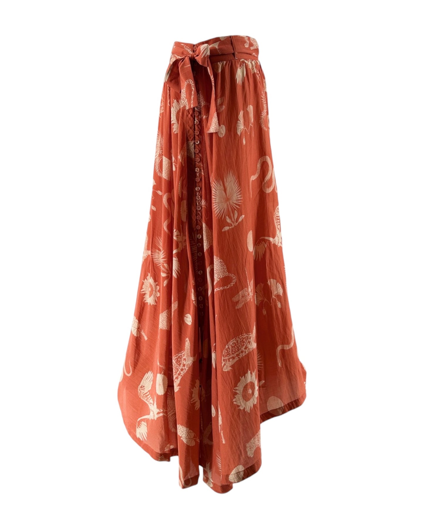 Orange skirt with white floral pattern on a white background
