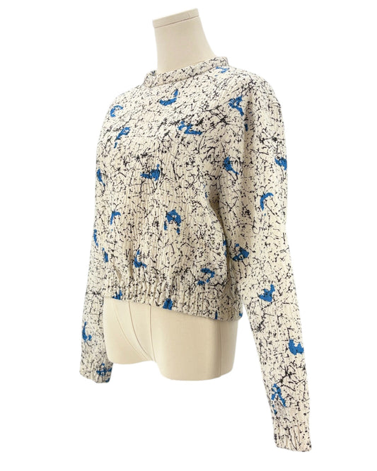 Banded waist long sleeve top with abstract pattern 
