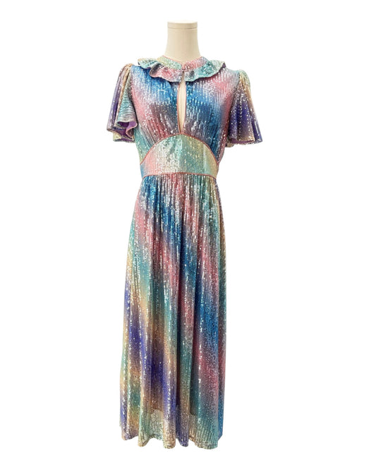 Multicolored dress on a mannequin against a white background
