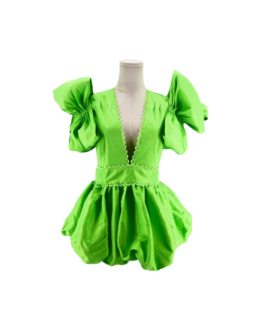 A bright lime green short dress with voluminous puff sleeves and a deep V-neckline, displayed on a mannequin torso against a plain white background.