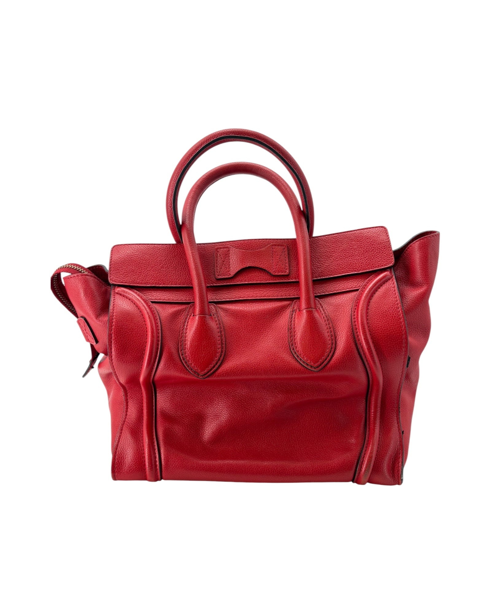 Red leather handbag on a white background