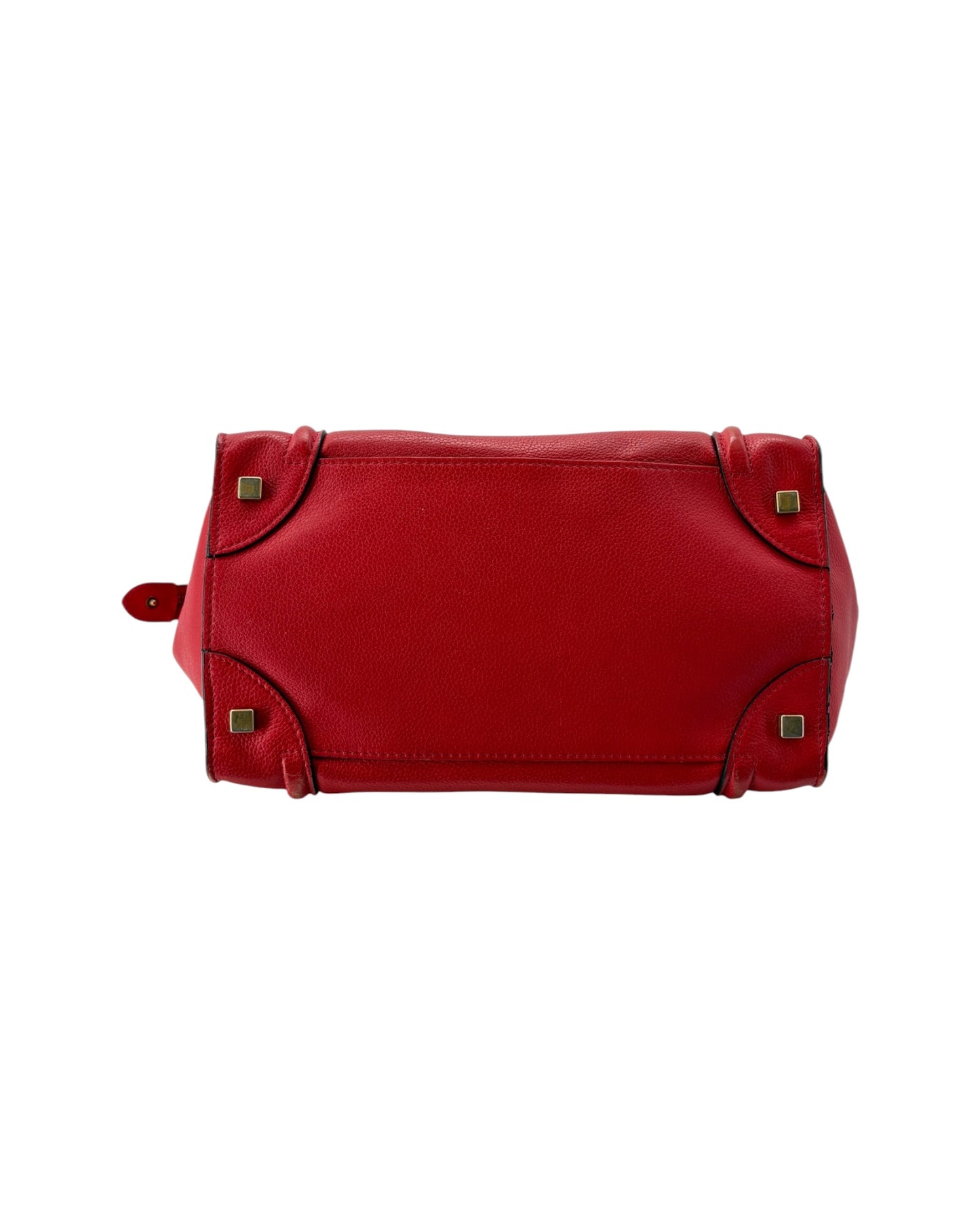 Red handbag with gold accents on a white background