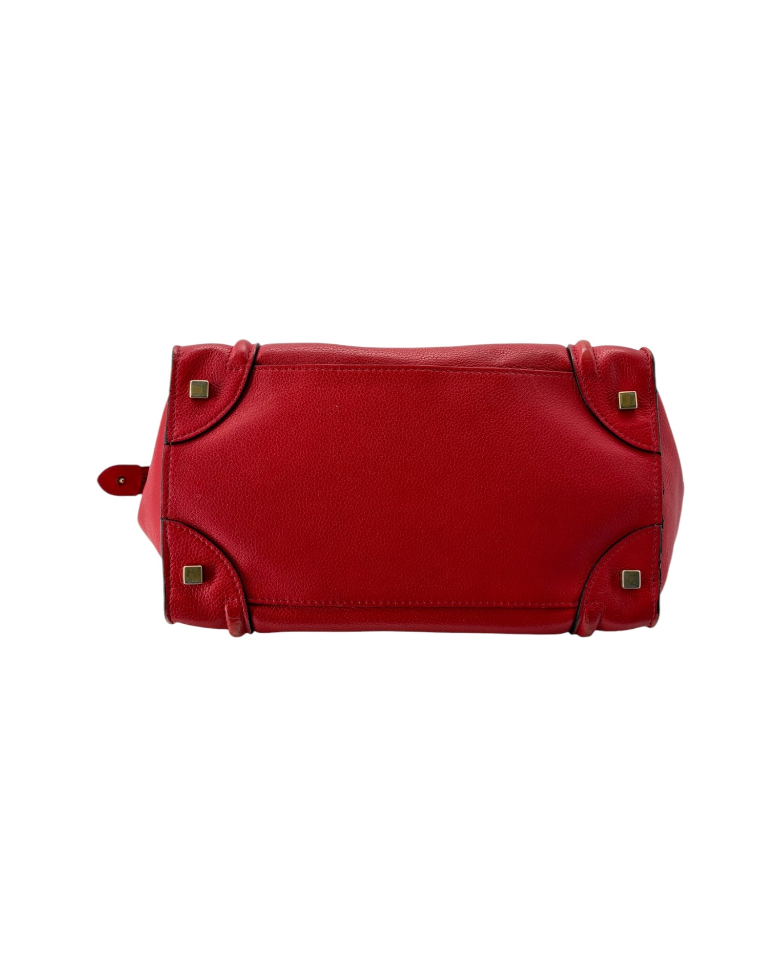 Red handbag with gold accents on a white background