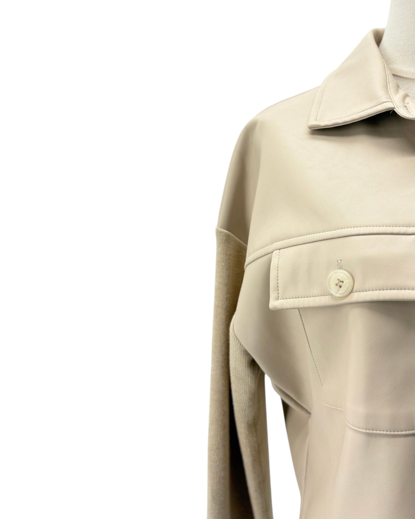 Beige trench coat on a mannequin against a white background