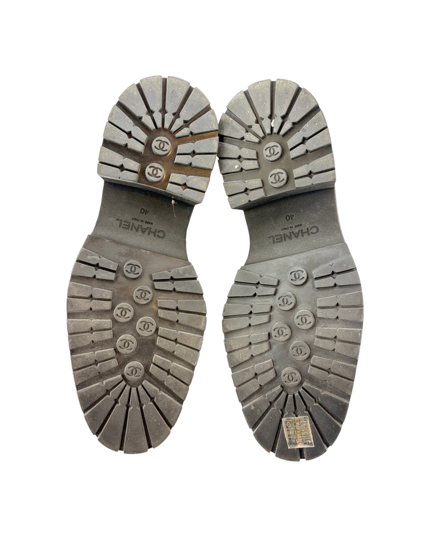 Close-up of Chanel shoe soles on a white background