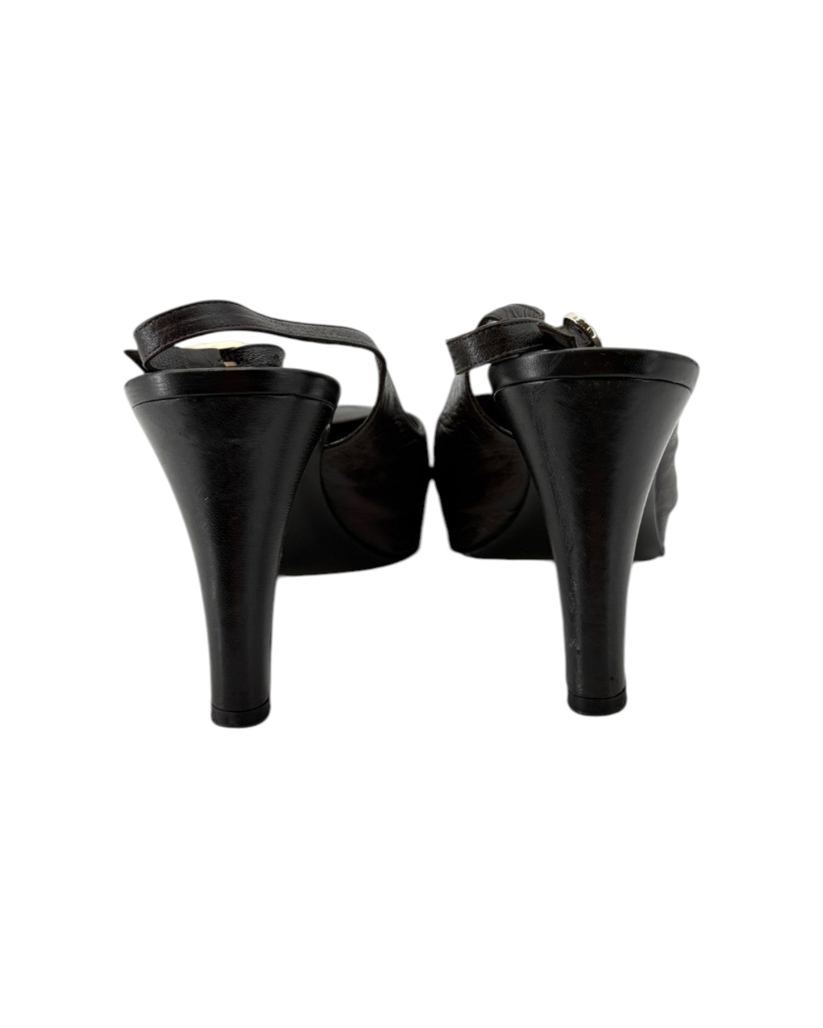 Black high-heeled shoes on a white background