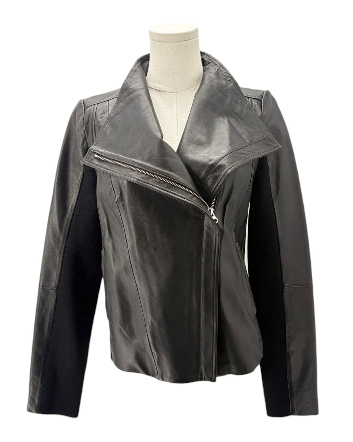 Black leather jacket on a mannequin against a white background