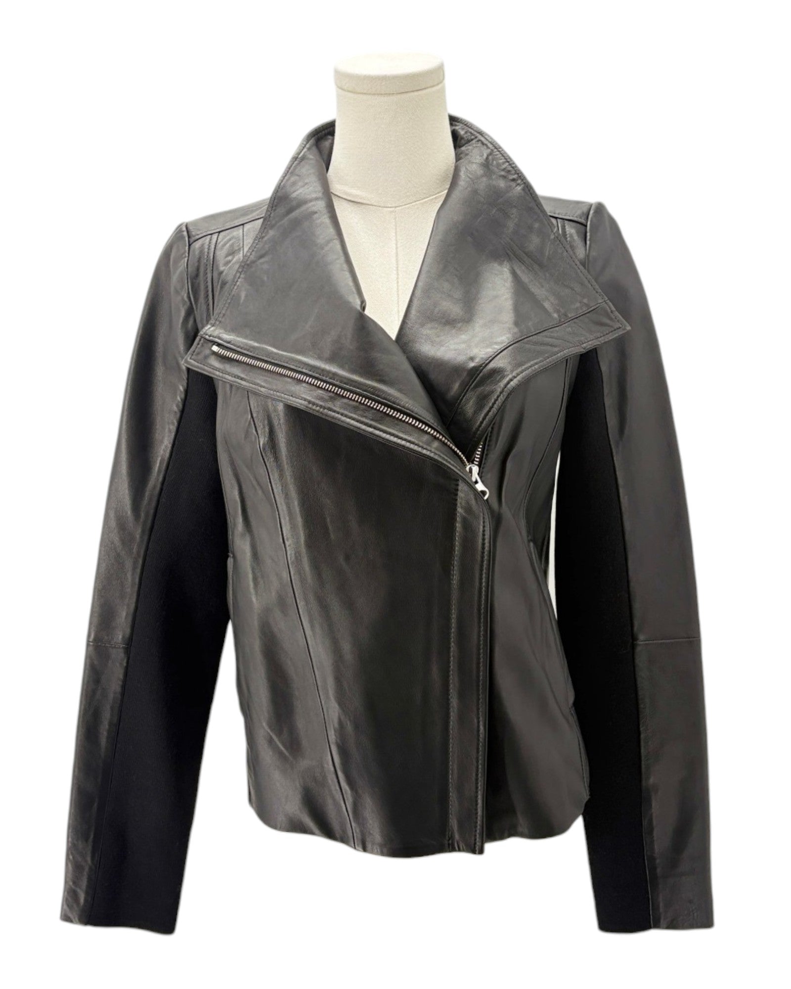 Black leather jacket on a mannequin against a white background