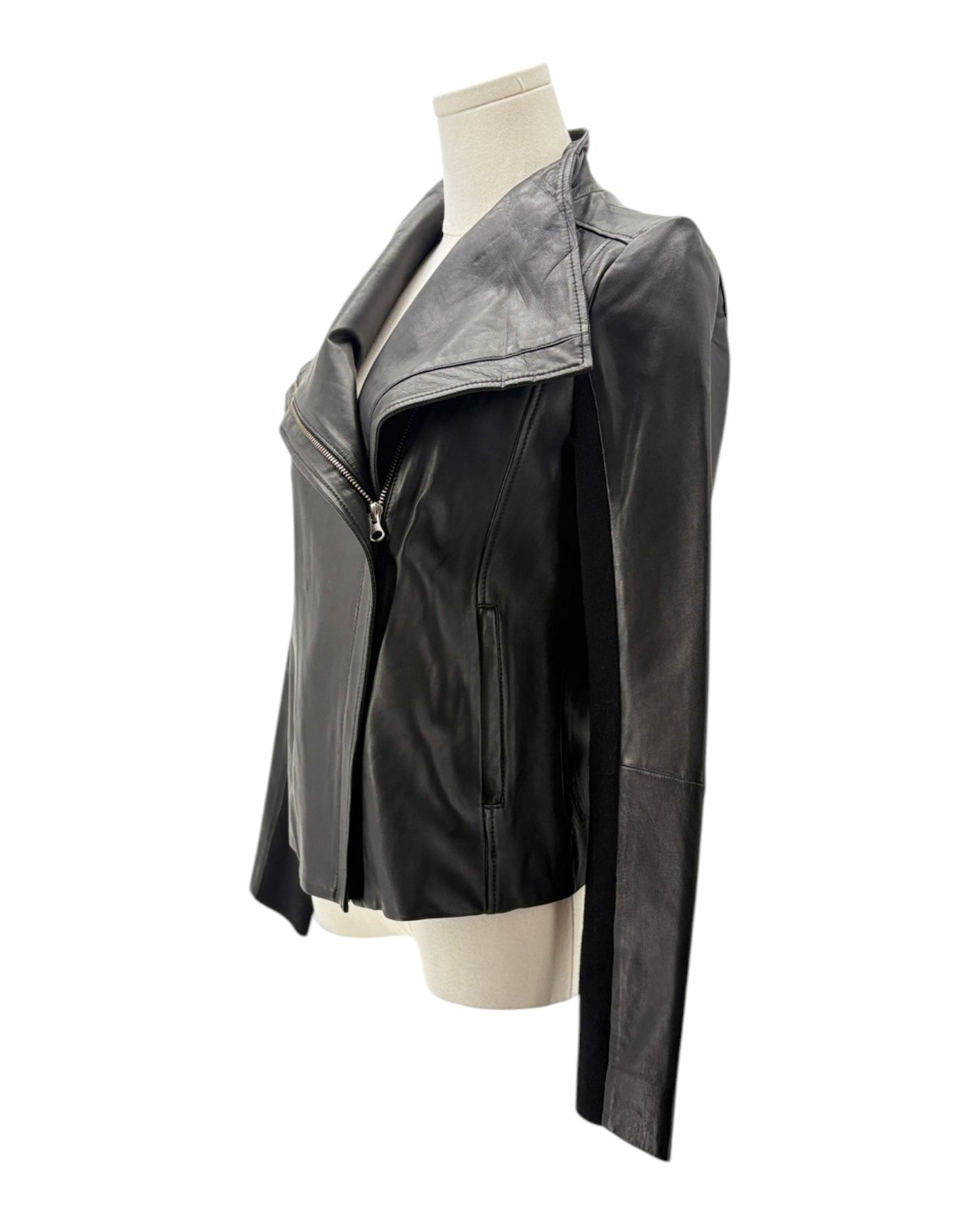 Black and gray jacket on a mannequin against a white background
