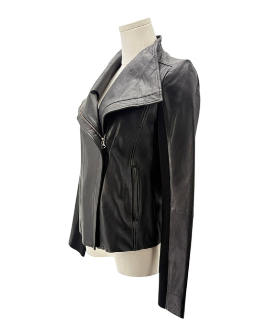 Black and gray jacket on a mannequin against a white background