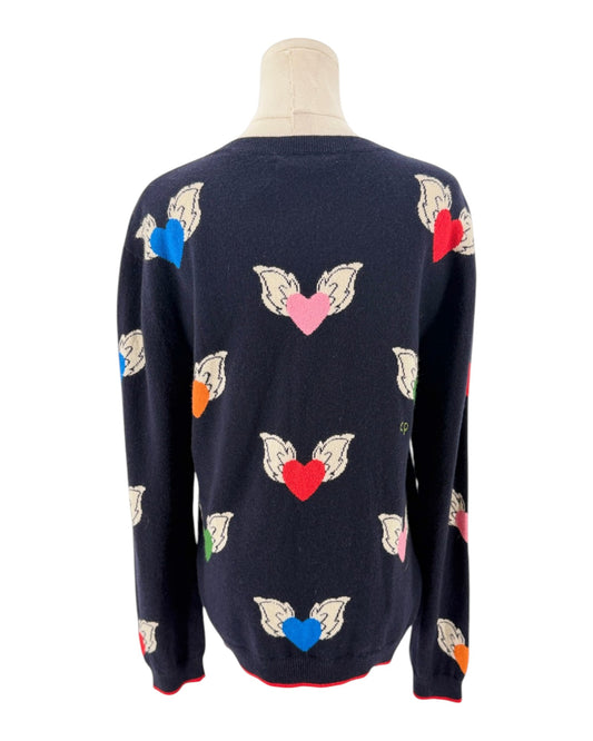 Navy blue sweater with colorful flying hearts pattern on a mannequin on a white background