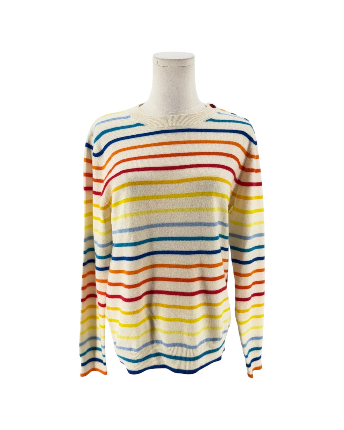 A long-sleeve knit sweater with horizontal rainbow stripes in blue, red, yellow, and orange on an off-white base, displayed on a mannequin torso against a white background.