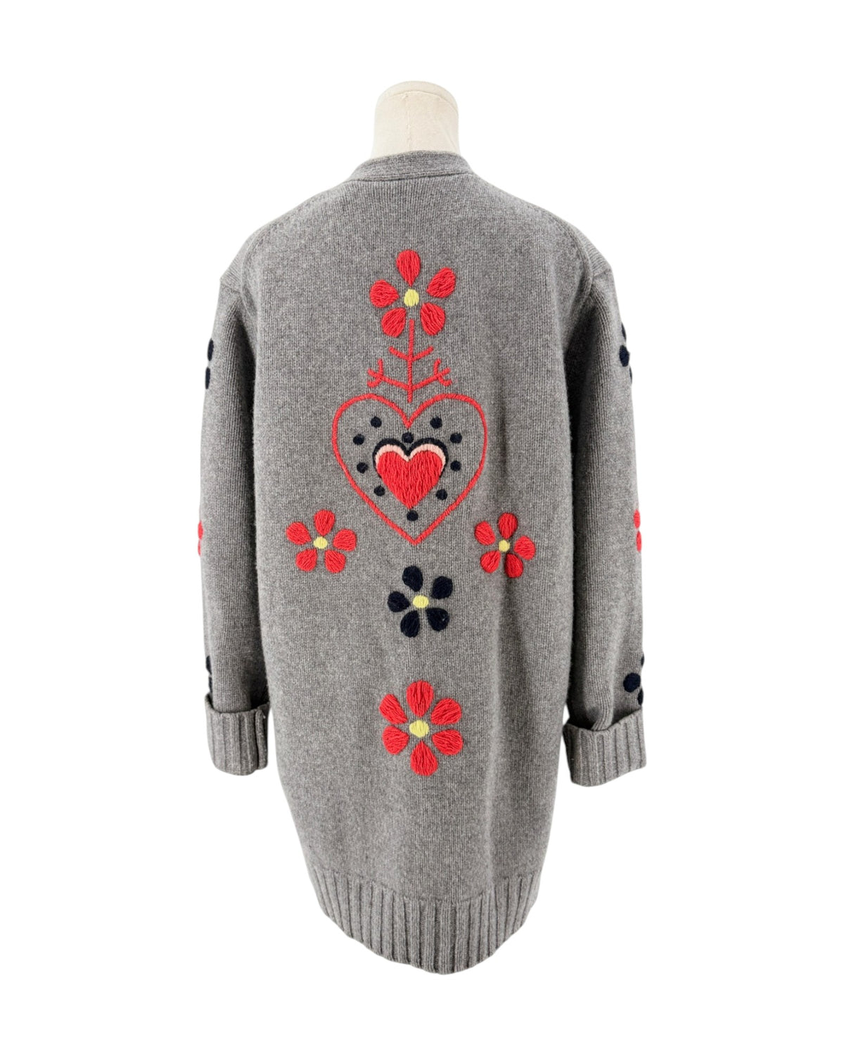 Grey button front cardigan with red floral and heart embroidery on a mannequin with a white background