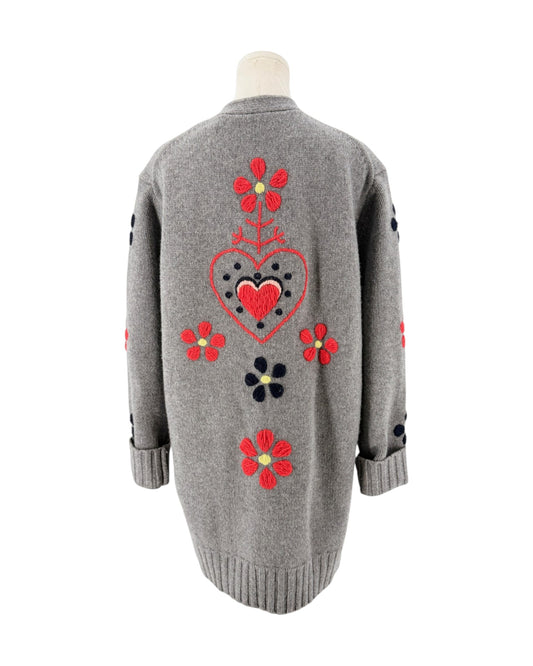 Grey button front cardigan with red floral and heart embroidery on a mannequin with a white background