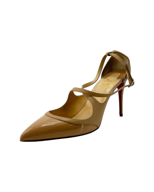 Beige high-heeled shoe with a slingback design on a white background