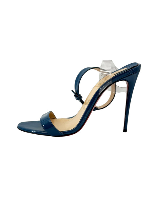 Blue high-heeled sandal on a white background